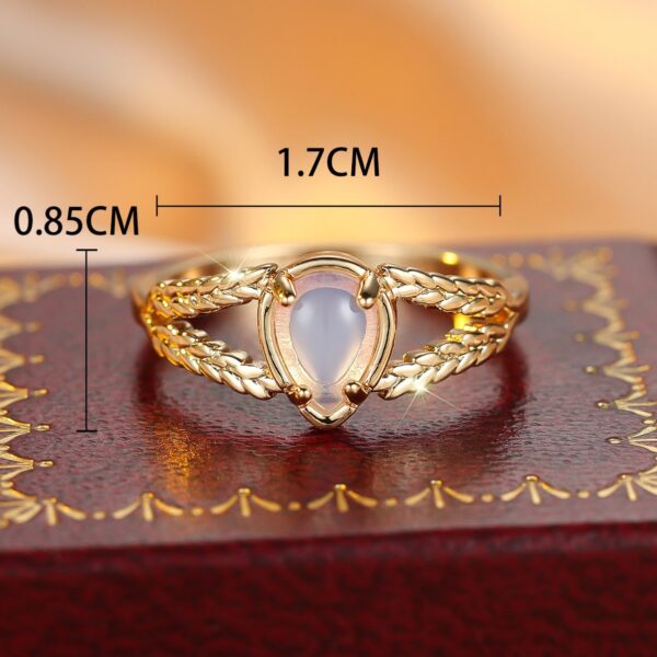 Round Golden Water Drop Protein Twist Hollow Ring - Image 2